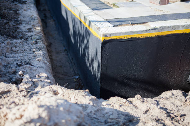 Professional Waterproofing technician working in Oakwood, OH
